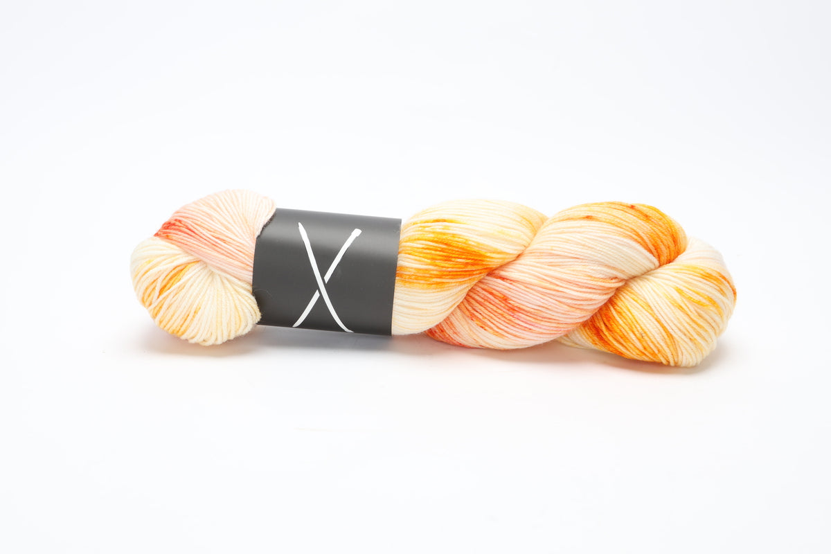 boots by the knitting loft - merino fingering yarn (part 1) creamsicle