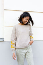 Young woman in knitted sweater