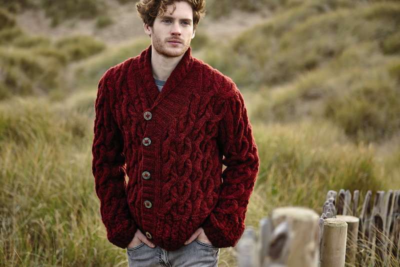 young man in knitted sweater in nature
