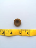 Button with tape measure