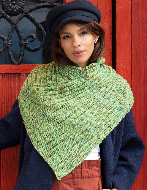 Woman wearing avocado green knitted cowl
